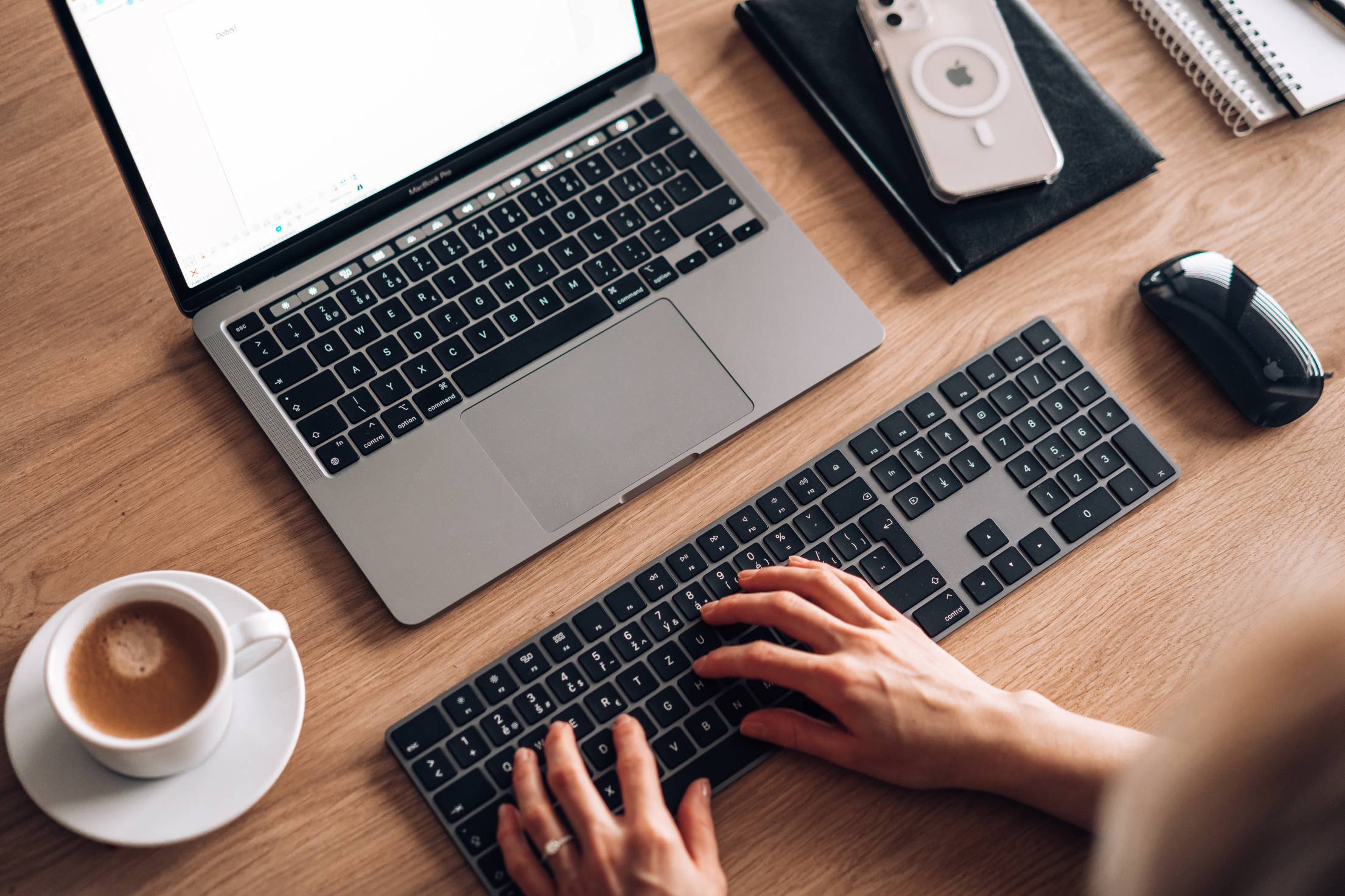 woman-writing-documents-on-laptop-with-full-size-keyboard-free-photo.jpg